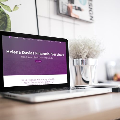 The homepage on the Helena Davies Financial Services website redesign shown on a laptop computer