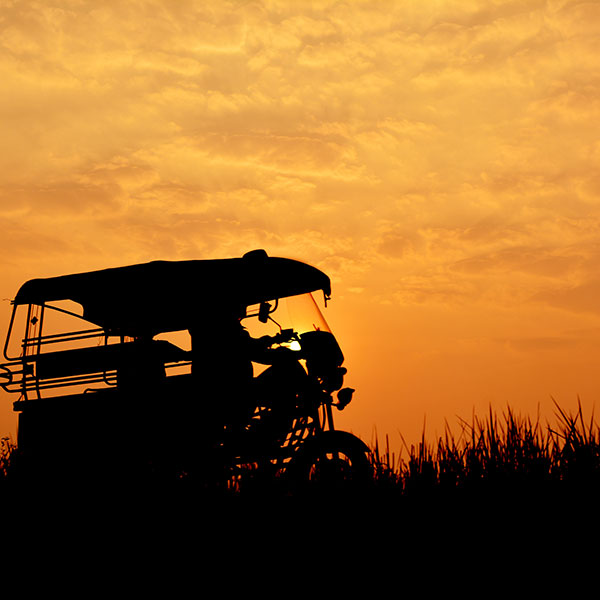 A TukTuk parked up at sunset in Thailland