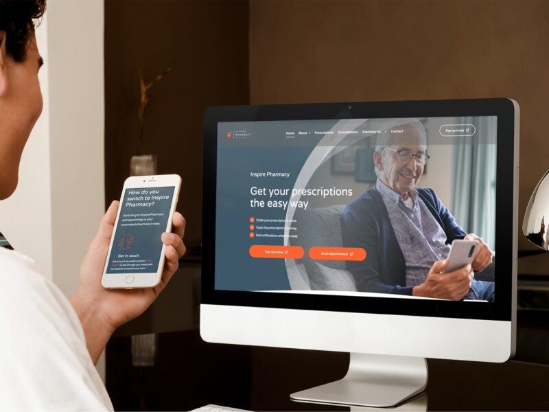 The website for Inspire Pharmacy displayed on a phone and computer